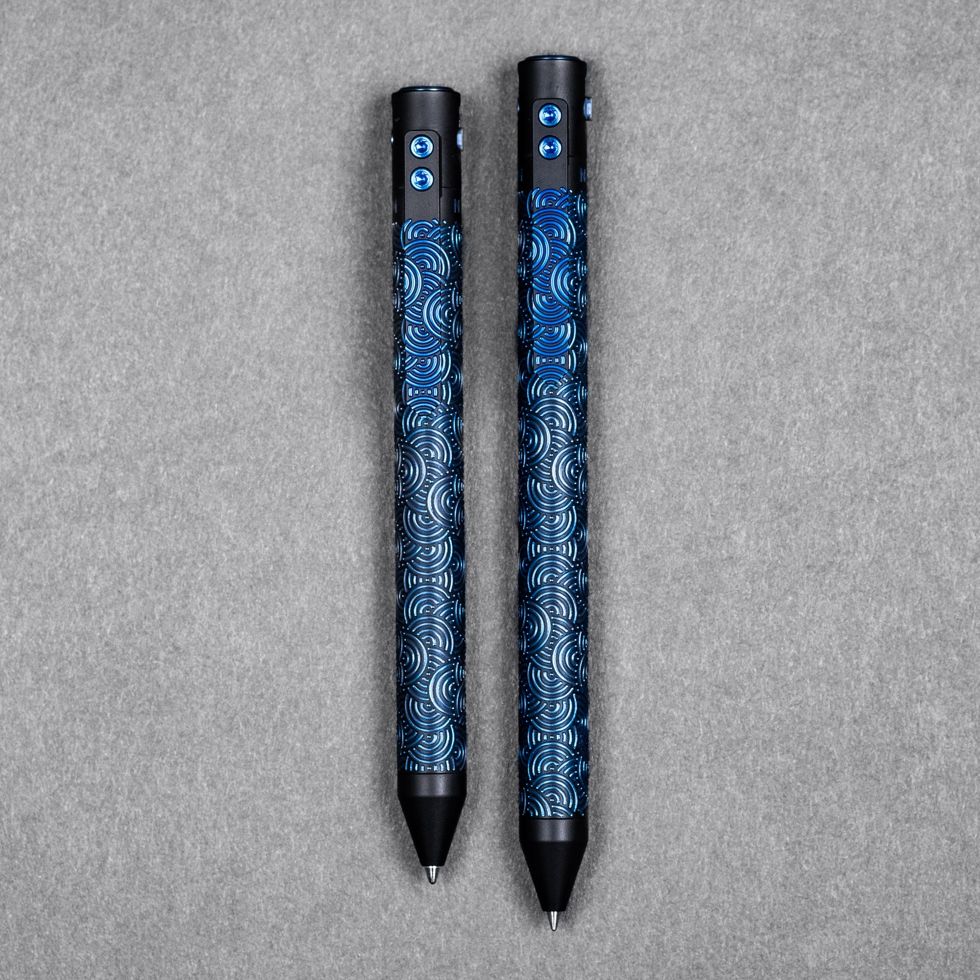 Nottingham Tactical TiButton Single Lock Pen - Two-Tone Black Ti Cerakote w/ Blue Chaos Seigaiha w/ Milled Chaos Seigaiha Clip