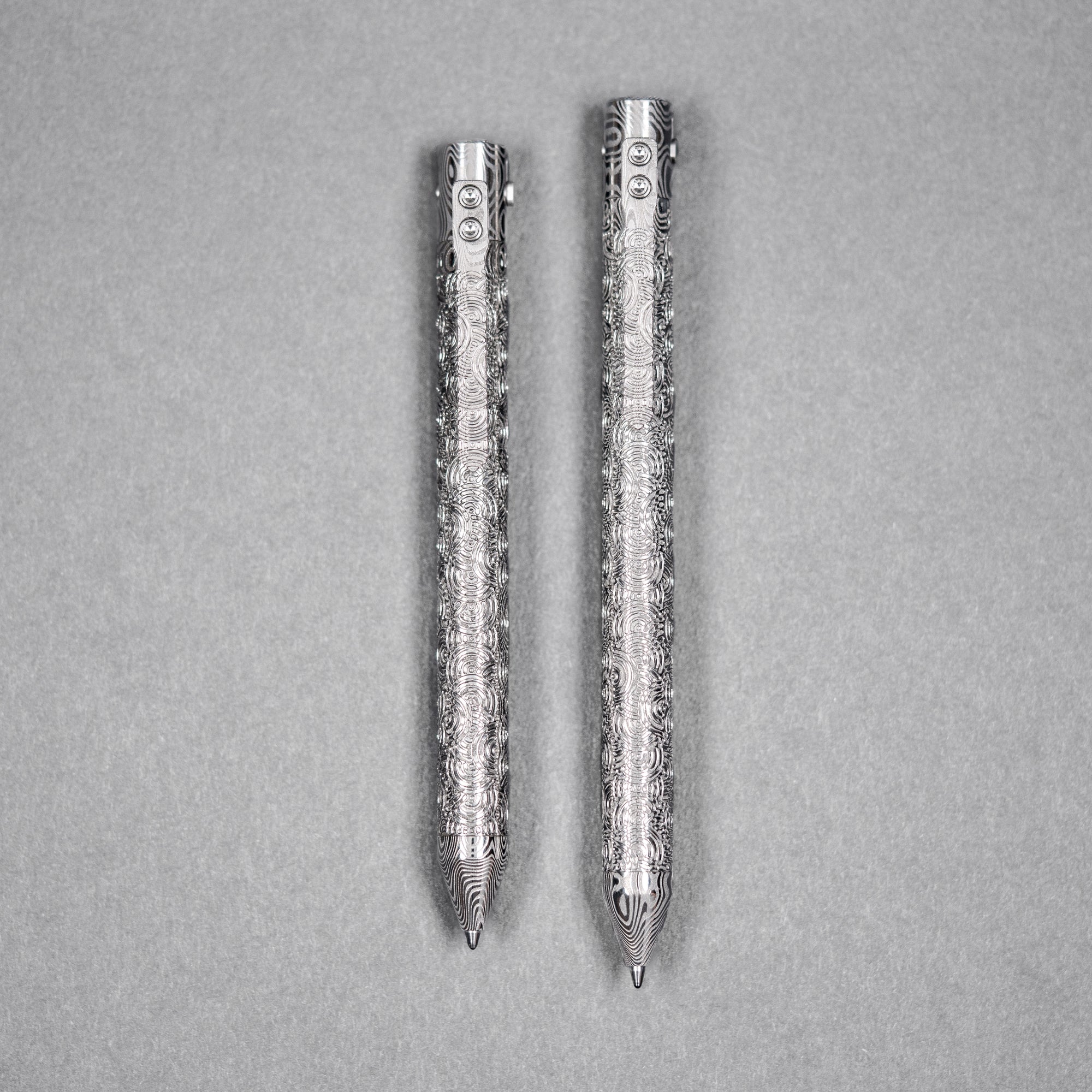 Drop Date (08/12): Nottingham Tactical x URBAN TiButton Single Lock Pen - Odin's Eye Damasteel w/ Chaos Seigaiha™