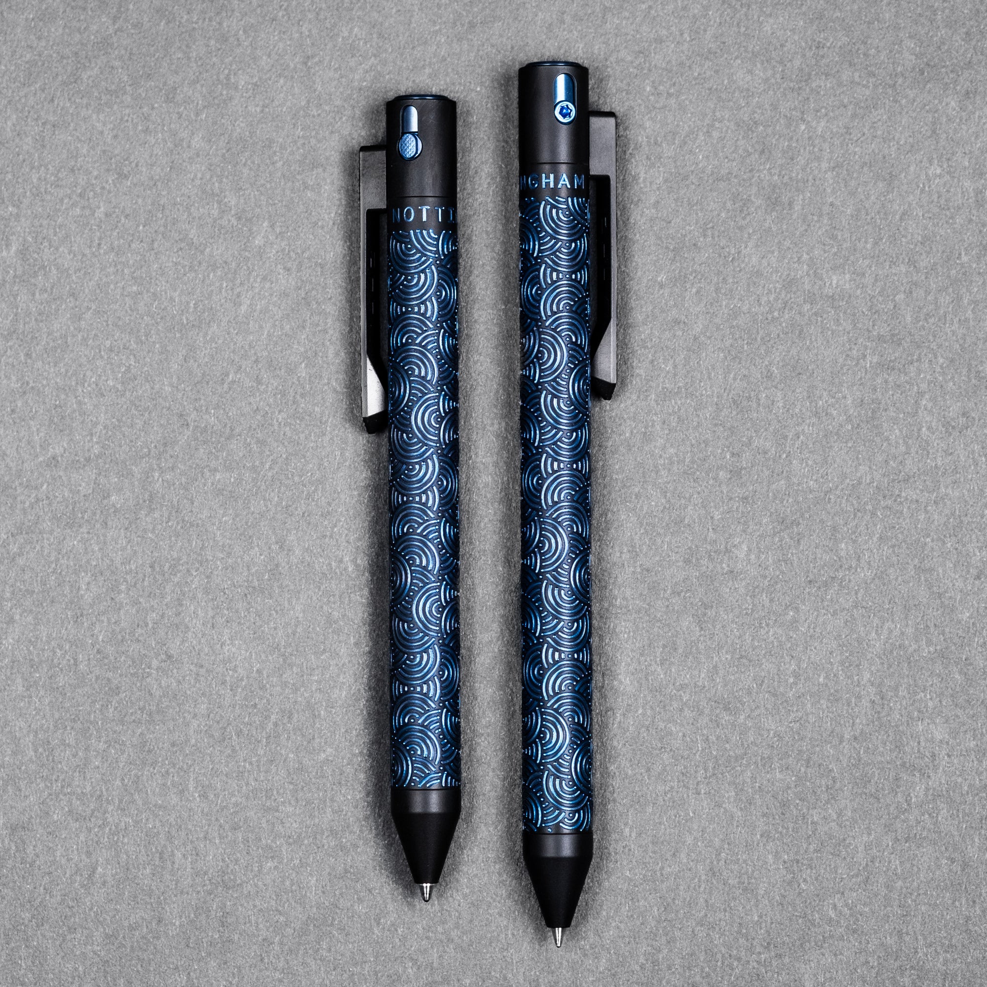 Nottingham Tactical TiButton Single Lock Pen - Two-Tone Black Ti Cerakote w/ Blue Chaos Seigaiha w/ Milled Chaos Seigaiha Clip