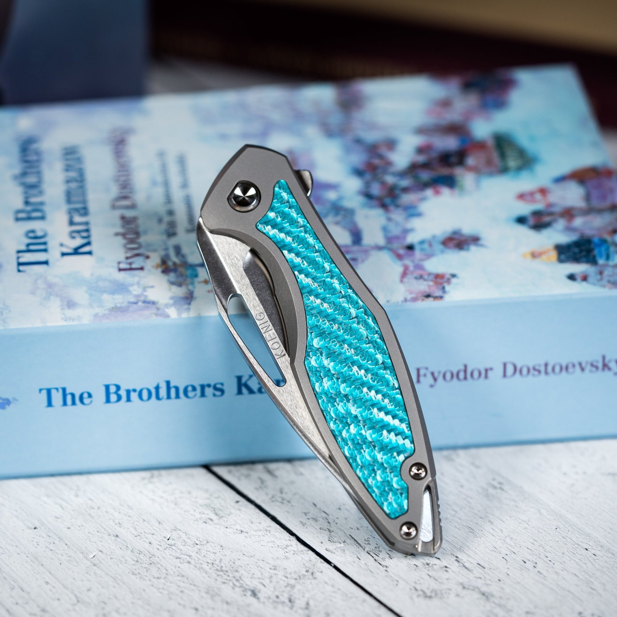 Drop Date (01/21): Koenig Mini Arius Flipper - Brightwashed w/ Polished Flats M390 & Aqua Teal Twill Inlay - URBAN EDC®