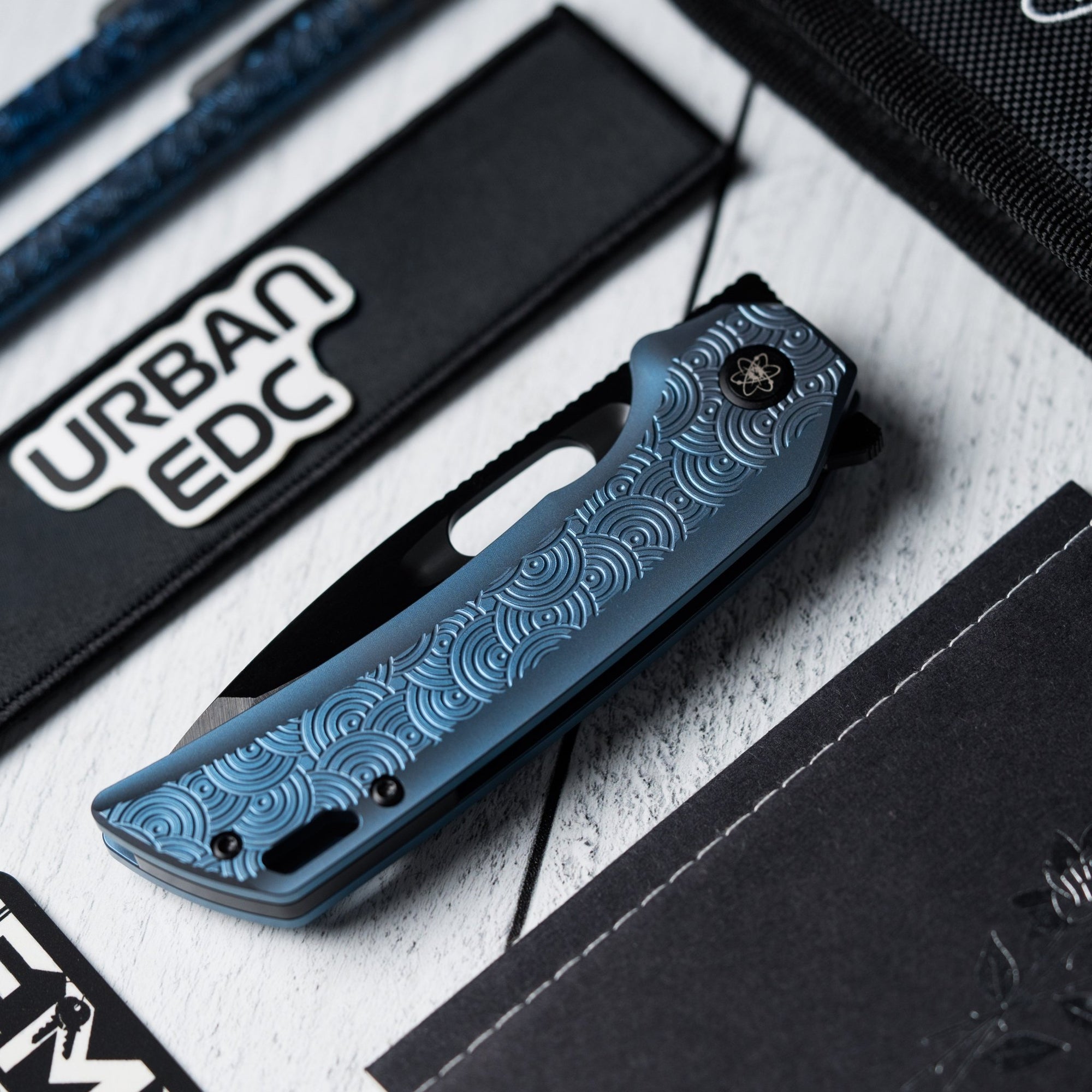 Drop Date (03/25): EMP EDC x URBAN Nymble XT - Belt Satin DLC Magnacut & Blue Anodized Ti w/ Chaos Seigaiha™ - URBAN EDC®
