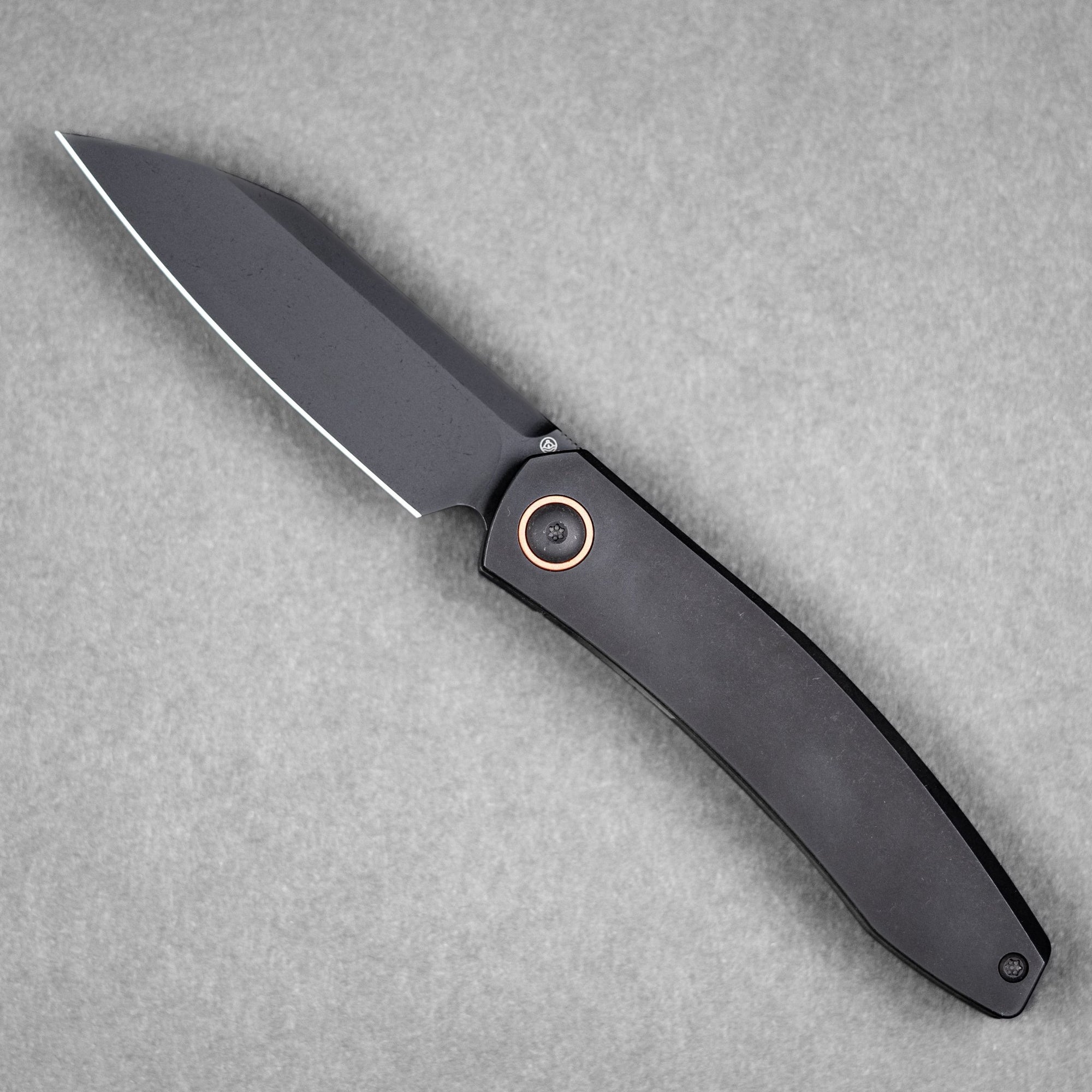 Drop Date (07/22): URBAN Chimarra - Blackwashed Magnacut & Blackwashed Titanium w/ Copper Pivot Collar & Backspacer - URBAN EDC®