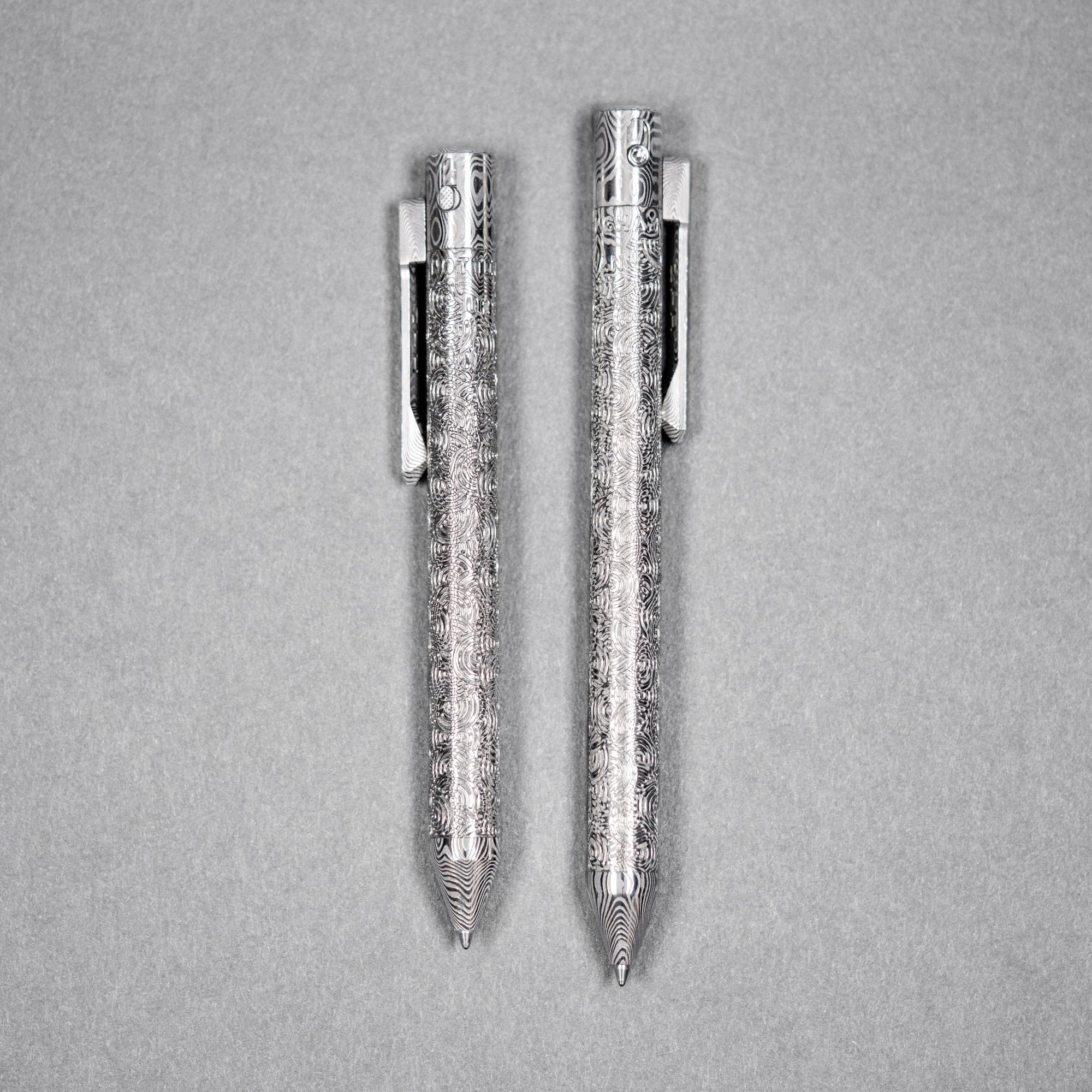 Drop Date (08/12): Nottingham Tactical x URBAN TiButton Single Lock Pen - Odin's Eye Damasteel w/ Chaos Seigaiha™ - URBAN EDC®